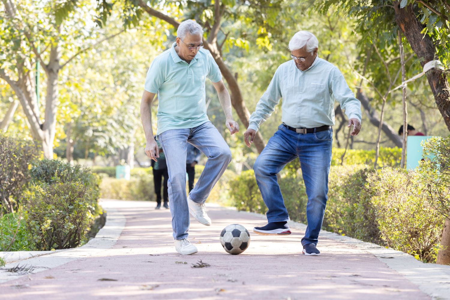 older generation staying healthy playing WalkSoccer